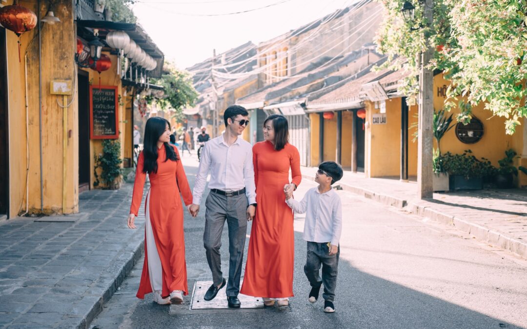 a group of people walking down a street